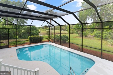 Nestled on a picturesque half-acre lot on the desirable Oak on Oak Grove Island Golf and Country Club in Georgia - for sale on GolfHomes.com, golf home, golf lot