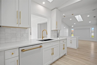 DEEP CREEK! STUNNING REMODELED 3-BEDROOM, 2.5-BATH, 2-CAR GARAGE on Deep Creek Golf Club in Florida - for sale on GolfHomes.com, golf home, golf lot