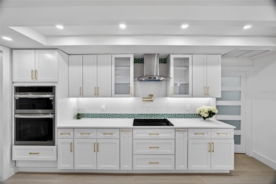 PUNTA GORDA ISLES! STUNNING MODERN 4 BEDROOM PLUS OFFICE, 3.5 on Saint Andrews South Golf Club in Florida - for sale on GolfHomes.com, golf home, golf lot