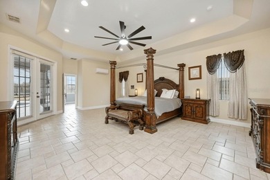 1.03 ACRES | NEWER ROOF & UPDATED MECHANICALS | LUXURY UPGRADES on Wedgefield Golf Club in Florida - for sale on GolfHomes.com, golf home, golf lot