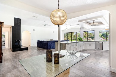 Step inside your own private, gated courtyard and prepare to be on Palm Desert Country Club in California - for sale on GolfHomes.com, golf home, golf lot