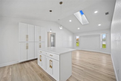 DEEP CREEK! STUNNING REMODELED 3-BEDROOM, 2.5-BATH, 2-CAR GARAGE on Deep Creek Golf Club in Florida - for sale on GolfHomes.com, golf home, golf lot