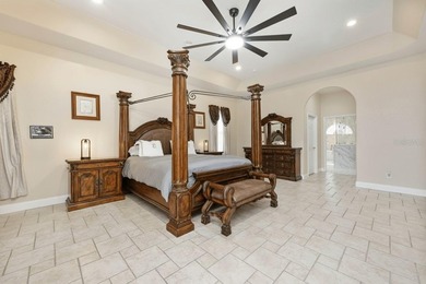 1.03 ACRES | NEWER ROOF & UPDATED MECHANICALS | LUXURY UPGRADES on Wedgefield Golf Club in Florida - for sale on GolfHomes.com, golf home, golf lot