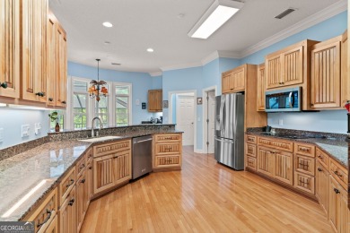 Nestled on a picturesque half-acre lot on the desirable Oak on Oak Grove Island Golf and Country Club in Georgia - for sale on GolfHomes.com, golf home, golf lot
