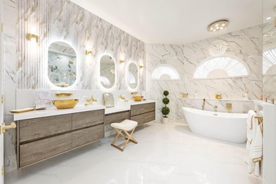 1.03 ACRES | NEWER ROOF & UPDATED MECHANICALS | LUXURY UPGRADES on Wedgefield Golf Club in Florida - for sale on GolfHomes.com, golf home, golf lot