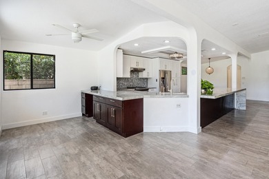 Step inside your own private, gated courtyard and prepare to be on Palm Desert Country Club in California - for sale on GolfHomes.com, golf home, golf lot