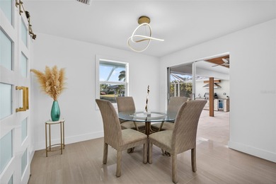 PUNTA GORDA ISLES! STUNNING MODERN 4 BEDROOM PLUS OFFICE, 3.5 on Saint Andrews South Golf Club in Florida - for sale on GolfHomes.com, golf home, golf lot