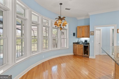 Nestled on a picturesque half-acre lot on the desirable Oak on Oak Grove Island Golf and Country Club in Georgia - for sale on GolfHomes.com, golf home, golf lot
