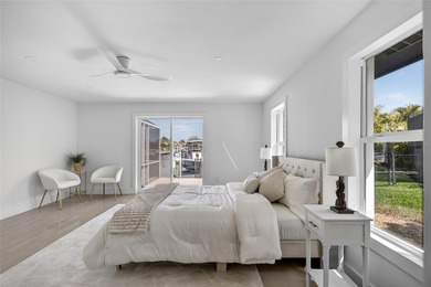 PUNTA GORDA ISLES! STUNNING MODERN 4 BEDROOM PLUS OFFICE, 3.5 on Saint Andrews South Golf Club in Florida - for sale on GolfHomes.com, golf home, golf lot