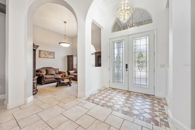 1.03 ACRES | NEWER ROOF & UPDATED MECHANICALS | LUXURY UPGRADES on Wedgefield Golf Club in Florida - for sale on GolfHomes.com, golf home, golf lot