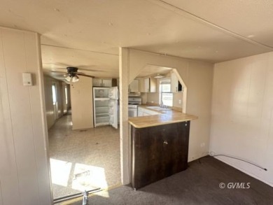 Bring your imagination and come see what this home can offer on Mt. Graham Municipal Golf Course in Arizona - for sale on GolfHomes.com, golf home, golf lot