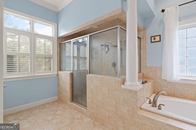 Nestled on a picturesque half-acre lot on the desirable Oak on Oak Grove Island Golf and Country Club in Georgia - for sale on GolfHomes.com, golf home, golf lot