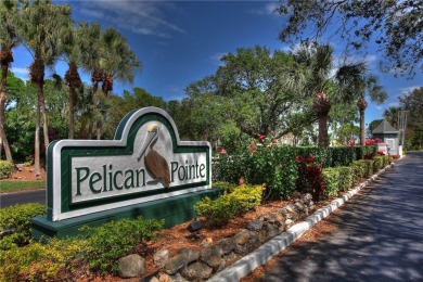 DISCOVER PELICAN POINTE: Your riverside paradise awaits! Enjoy on Pelican Pointe 9 Hole Course in Florida - for sale on GolfHomes.com, golf home, golf lot