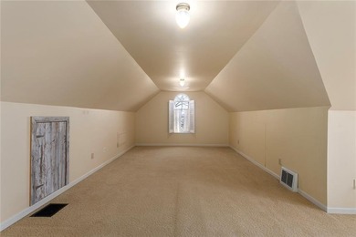 Stone Ranch cottage in coveted Golden Acres is pure magic on Drumm Farm Golf Course in Missouri - for sale on GolfHomes.com, golf home, golf lot