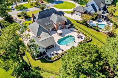 Welcome to this stunning all-brick 4-bedroom, 3.5-bath home, on on Myrtlewood Golf Course and Club  in South Carolina - for sale on GolfHomes.com, golf home, golf lot