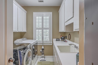 This one-of-a-kind single-story residence with bonus room over on Coosaw Creek Country Club in South Carolina - for sale on GolfHomes.com, golf home, golf lot