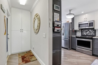 EXQUISITE 1ST FLOOR CORNER IN SOUGHT AFTER ARUBA VILLAGE ON THE on Wynmoor Golf Course in Florida - for sale on GolfHomes.com, golf home, golf lot