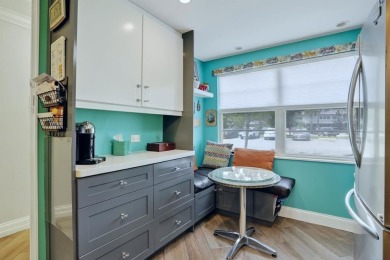 EXQUISITE 1ST FLOOR CORNER IN SOUGHT AFTER ARUBA VILLAGE ON THE on Wynmoor Golf Course in Florida - for sale on GolfHomes.com, golf home, golf lot