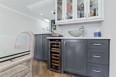 EXQUISITE 1ST FLOOR CORNER IN SOUGHT AFTER ARUBA VILLAGE ON THE on Wynmoor Golf Course in Florida - for sale on GolfHomes.com, golf home, golf lot