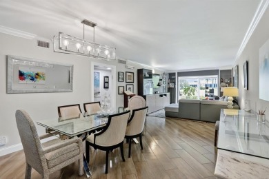 EXQUISITE 1ST FLOOR CORNER IN SOUGHT AFTER ARUBA VILLAGE ON THE on Wynmoor Golf Course in Florida - for sale on GolfHomes.com, golf home, golf lot