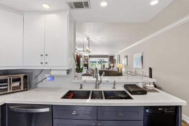 EXQUISITE 1ST FLOOR CORNER IN SOUGHT AFTER ARUBA VILLAGE ON THE on Wynmoor Golf Course in Florida - for sale on GolfHomes.com, golf home, golf lot