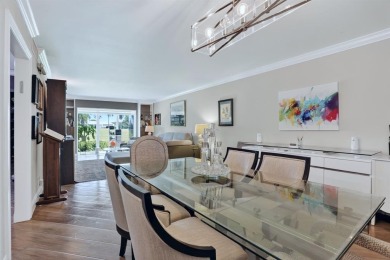 EXQUISITE 1ST FLOOR CORNER IN SOUGHT AFTER ARUBA VILLAGE ON THE on Wynmoor Golf Course in Florida - for sale on GolfHomes.com, golf home, golf lot