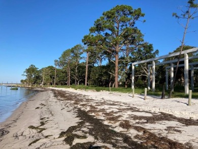 Improved BAY FRONT/GULF FRONT Lot with concrete pilings in place on St. James Bay in Florida - for sale on GolfHomes.com, golf home, golf lot