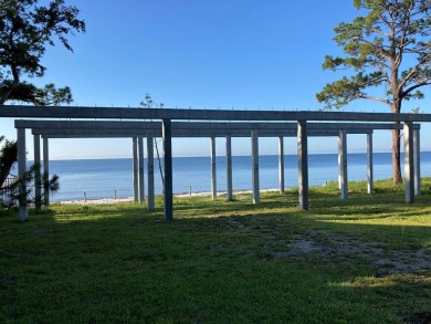 Improved BAY FRONT/GULF FRONT Lot with concrete pilings in place on St. James Bay in Florida - for sale on GolfHomes.com, golf home, golf lot