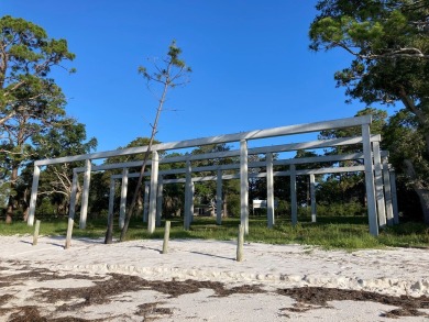 Improved BAY FRONT/GULF FRONT Lot with concrete pilings in place on St. James Bay in Florida - for sale on GolfHomes.com, golf home, golf lot