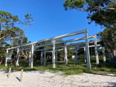 Improved BAY FRONT/GULF FRONT Lot with concrete pilings in place on St. James Bay in Florida - for sale on GolfHomes.com, golf home, golf lot