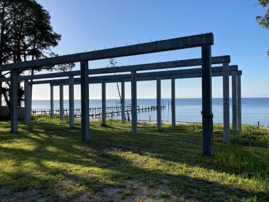 Improved BAY FRONT/GULF FRONT Lot with concrete pilings in place on St. James Bay in Florida - for sale on GolfHomes.com, golf home, golf lot