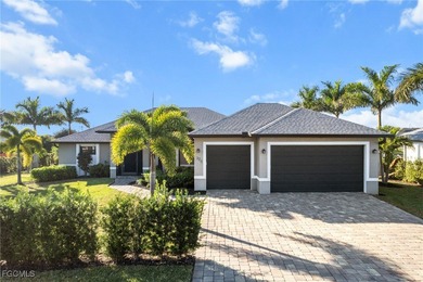 Waterfront Pool Home SW Cape Coral! This newer construction home on Palmetto-Pine Country Club in Florida - for sale on GolfHomes.com, golf home, golf lot