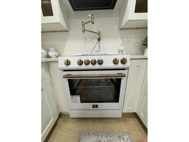 This upgraded designer unit will not last- FORNO appliances on Kings Point Golf -Flanders Way in Florida - for sale on GolfHomes.com, golf home, golf lot