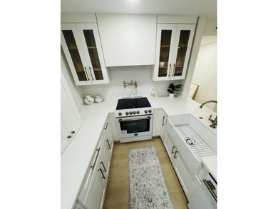 This upgraded designer unit will not last- FORNO appliances on Kings Point Golf -Flanders Way in Florida - for sale on GolfHomes.com, golf home, golf lot