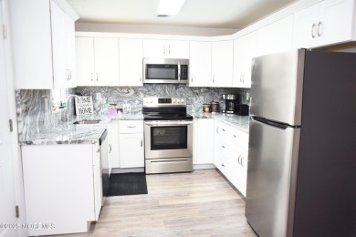 Welcome to Leisure Village West!  This End Unit Winfield Model on Leisure Village West Assoc. in New Jersey - for sale on GolfHomes.com, golf home, golf lot