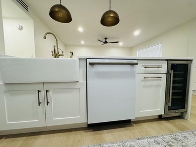 This upgraded designer unit will not last- FORNO appliances on Kings Point Golf -Flanders Way in Florida - for sale on GolfHomes.com, golf home, golf lot