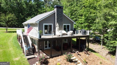 This beautifully remodeled 4 bed, 2 bath home in the Turtle Cove on Turtle Cove Golf Course in Georgia - for sale on GolfHomes.com, golf home, golf lot