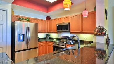 Furnished two bedroom, two bathroom with den that could easily on Oceans Golf Club in Florida - for sale on GolfHomes.com, golf home, golf lot