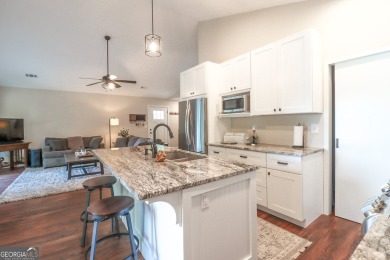 This beautifully remodeled 4 bed, 2 bath home in the Turtle Cove on Turtle Cove Golf Course in Georgia - for sale on GolfHomes.com, golf home, golf lot