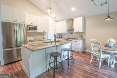 This beautifully remodeled 4 bed, 2 bath home in the Turtle Cove on Turtle Cove Golf Course in Georgia - for sale on GolfHomes.com, golf home, golf lot