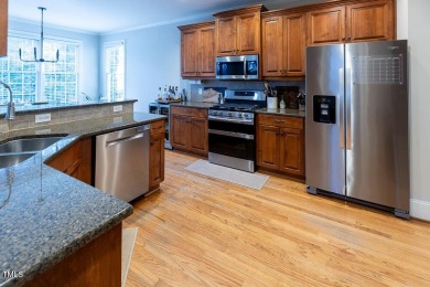 Welcome to this beautifully maintained 4 bedroom, 2.5 bath home on Heritage Golf Club in North Carolina - for sale on GolfHomes.com, golf home, golf lot