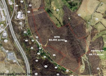 Developers! This property has more than 1,700 feet fronting golf on Mountaineer Golf & Country Club in West Virginia - for sale on GolfHomes.com, golf home, golf lot