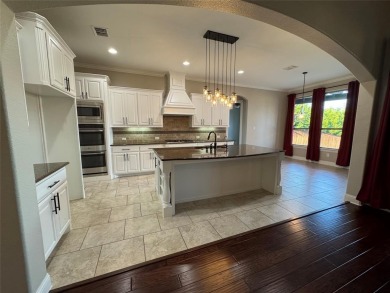 House is 6 bed, 5 bath with rec room, media room, office on Trophy Club of Dallas in Texas - for sale on GolfHomes.com, golf home, golf lot
