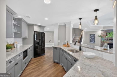 Welcome to this exceptional 3-sides brick, 6 BEDROOMS, 5 BATH on Canongate At Olde Atlanta Golf Club in Georgia - for sale on GolfHomes.com, golf home, golf lot
