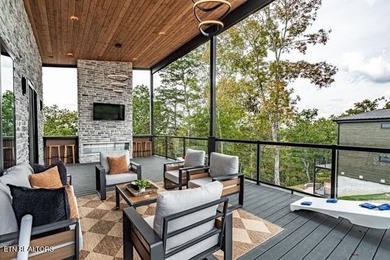 Stunning brand-new 4-bedroom, 5-bath luxury cabin featuring both on Sevierville Golf Club in Tennessee - for sale on GolfHomes.com, golf home, golf lot