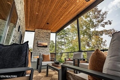 Stunning brand-new 4-bedroom, 5-bath luxury cabin featuring both on Sevierville Golf Club in Tennessee - for sale on GolfHomes.com, golf home, golf lot