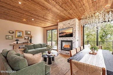 Stunning brand-new 4-bedroom, 5-bath luxury cabin featuring both on Sevierville Golf Club in Tennessee - for sale on GolfHomes.com, golf home, golf lot