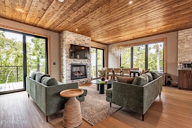 Stunning brand-new 4-bedroom, 5-bath luxury cabin featuring both on Sevierville Golf Club in Tennessee - for sale on GolfHomes.com, golf home, golf lot