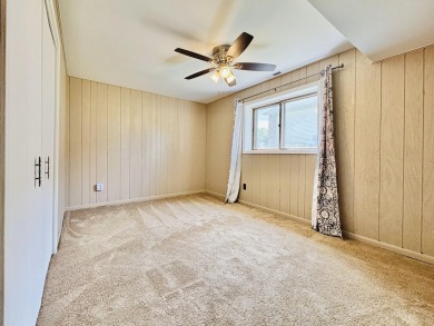 Move right in to this beautiful brick and spacious 4-bedroom on Lakes of the Four Seasons Country Club in Indiana - for sale on GolfHomes.com, golf home, golf lot