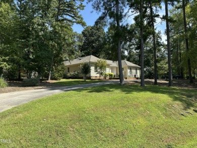 This beautiful, well-maintained home in West Henderson sits on a on Henderson Country Club in North Carolina - for sale on GolfHomes.com, golf home, golf lot